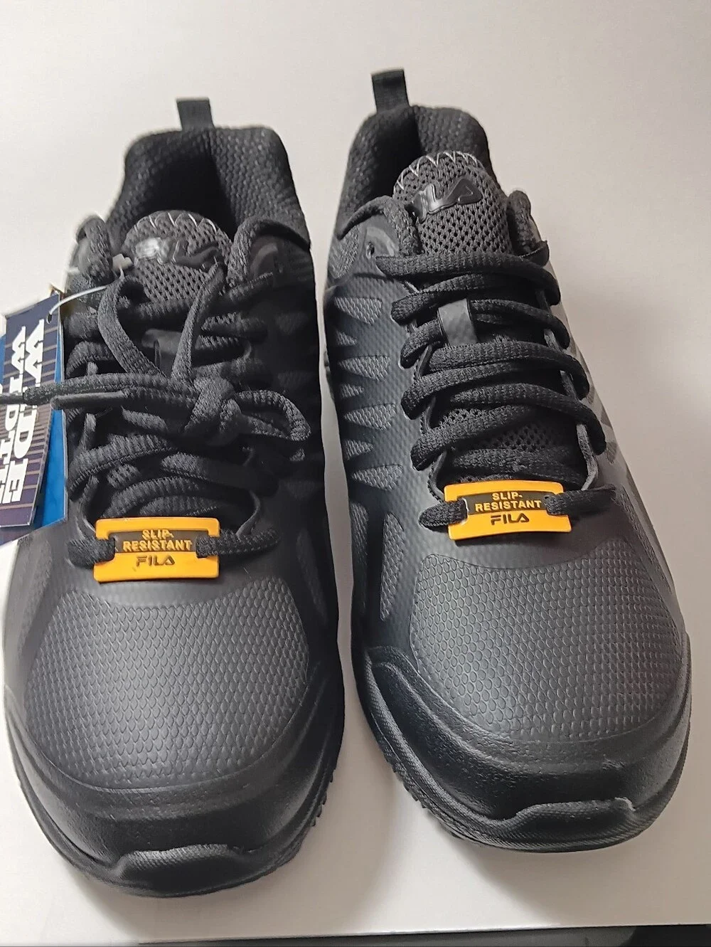 Fila Men’s Black Athletic Slip-Resistant Sneakers with Yellow Accents